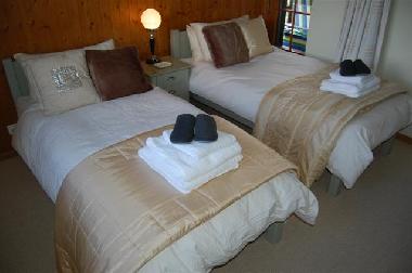 One of the twin or double bedrooms
