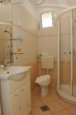 Studio Nika - bathroom with a shower and a toilet