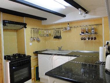 The downstairs kitchen -fully equipped. There is another kitchen with the roof terrace!