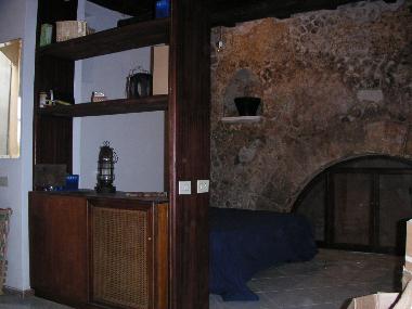 bedroom and Roman arch