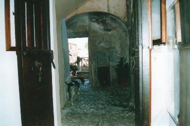 view of Capitolium from inside through the private courtyhard