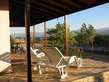 Broad shaded terrace looking to the sea and the Peloponisis