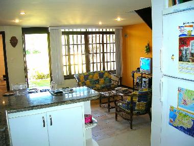     front entrance and lounge view from the fully fitted kitchen