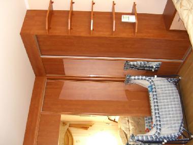 wardrobe in a sleeping room