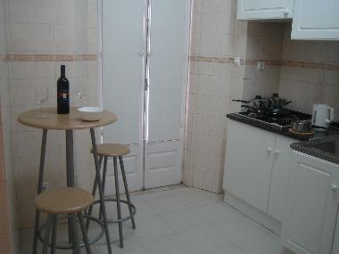 part of the kitchen with access to balcony