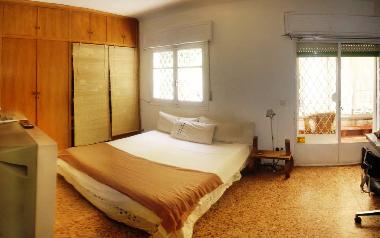 principal bedroom with balcony and terrace