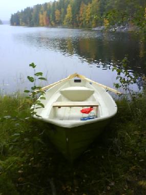 Boat by lake.