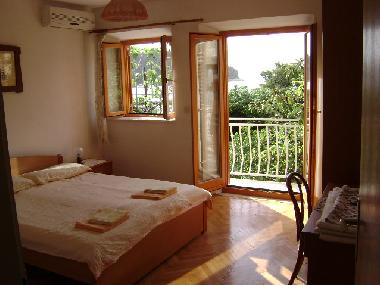 Bedroom with balcony