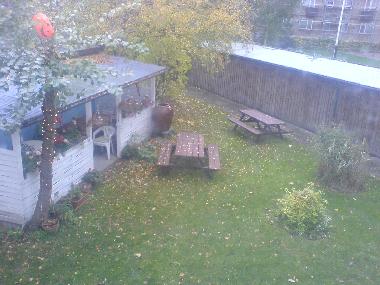 The green yard with posible to barbecue.