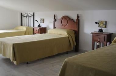 bedroom nr.5 - this spacy attic room has 4- 5 beds