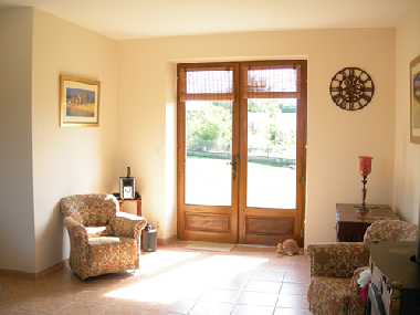 French doors in lounge leading to terrace and garden