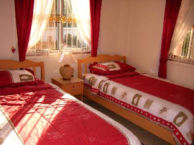 Twin room with 2 single beds after sunrise