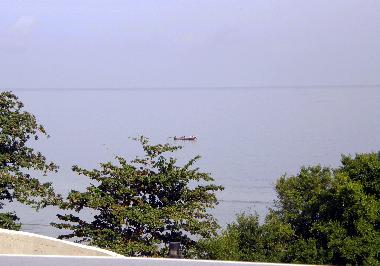 View of fishing boat from hammock.