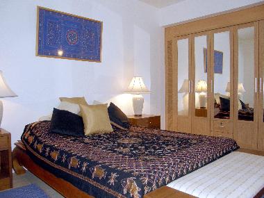 Second bedroom and wardrobe.