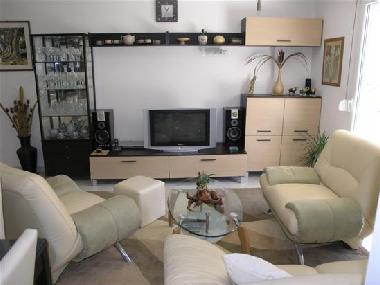 Living room with air-con, big screen TV/SAT, DVD