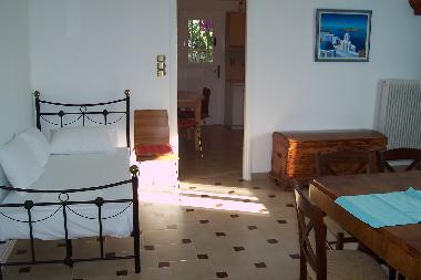 Living room , in the back is the kitchen