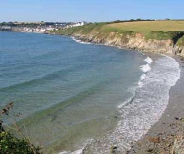 Porthcurnick Beach with the tide in