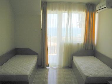 Master Bedroom with balcony and sea view.