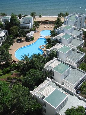 Swimming pool before the beautiful beach
