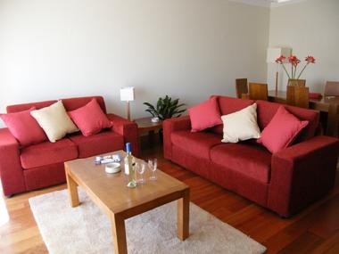 sitting room with sofabeds and dining table for six