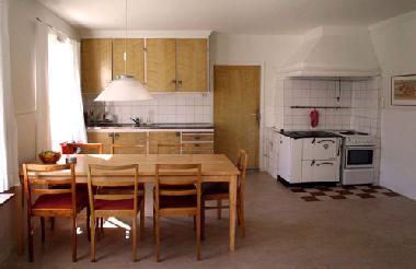 Country kitchen with extension table.