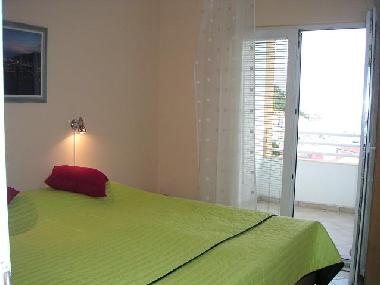 Bedroom with balcony