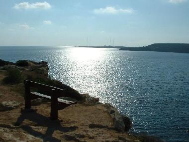 Sit on the bench and watch the sun setting