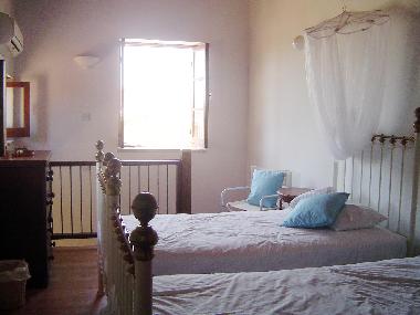 The House of Achilles-Balius Twin Bedroom