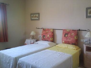 Upstairs bedroom made up as twin