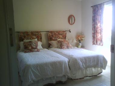 Ground floor bedroom made up as twin