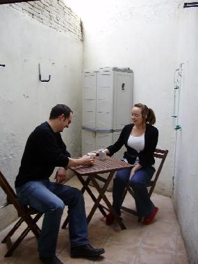 Having a coffee on the patio, which is accessed through the main bedroom. 