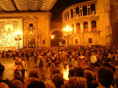 A festival at night in Plaza de la Virgin. 