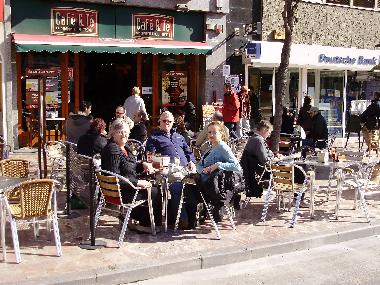 Enjoying a coffee on the terrace in Plaza de la Reina