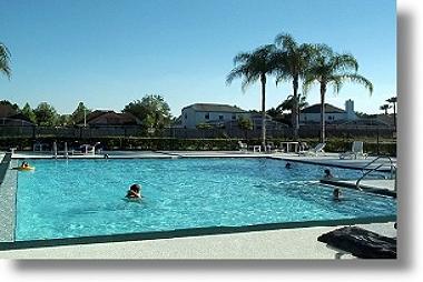 Beautiful heated pool with hot tub off to the right