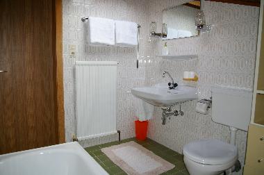 Bathrooms in Apartments 4 and 5