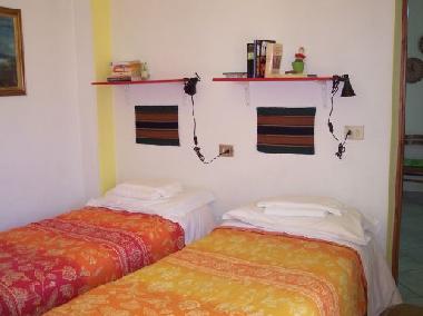 Double room with window to the private terrace and the garden.
