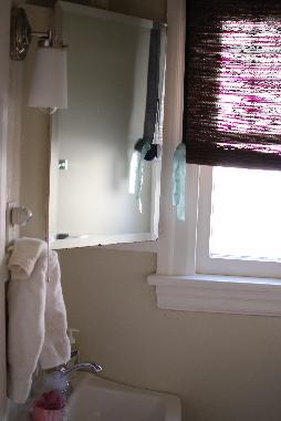 Half bath, off of the Master Bedroom and hallway.