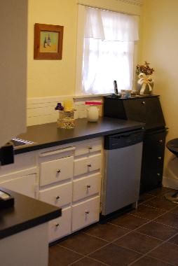 Plenty of preparation space, in the kitchen, and secretary desk.
