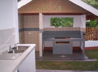 (A) BBQ and outside shower- handy after coming from beach.