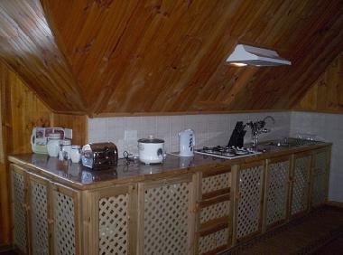 ( B ) - Kitchennette area of Second facility.
