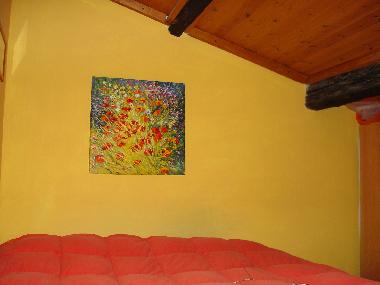 Loft bedroom with skylight and AC