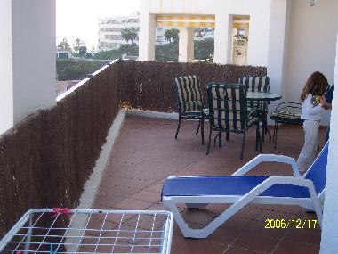 Big terrace (30m2) with diningplace and 3 sunbeds.