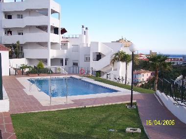 Big pool with showers.