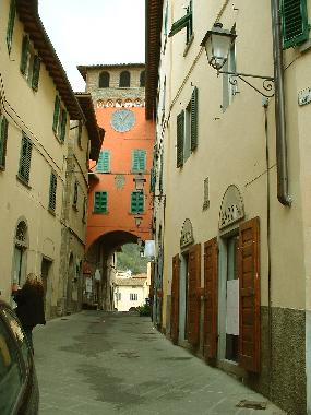 Loro Ciuffenna Village. The old main street and clock tower