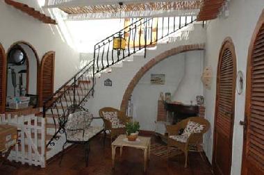 Living room with open fire place