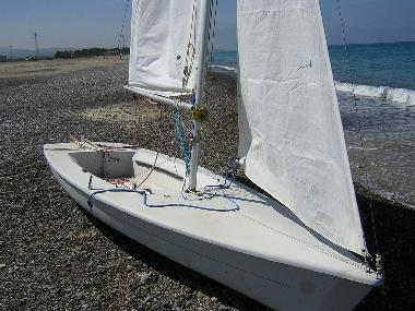 Rigging the sails for a day with the waves.