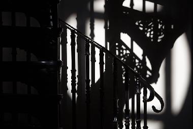 Cast iron spiral staircase to the gallery bedroom