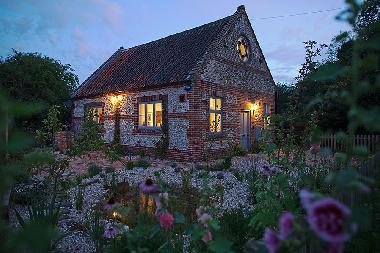 The Old Chapel and garden at dusk