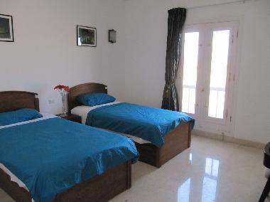 Second Bedroom with marble floors