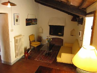 Die komfortabel eingerichteten Lounge im toskanischen Stil. Idealer Ort sich bei einem Glas Wein zur